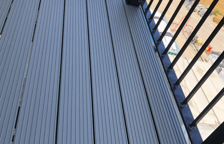 AliDeck Non-combustible Aluminium metal decking installed on balconies at Stevenage development