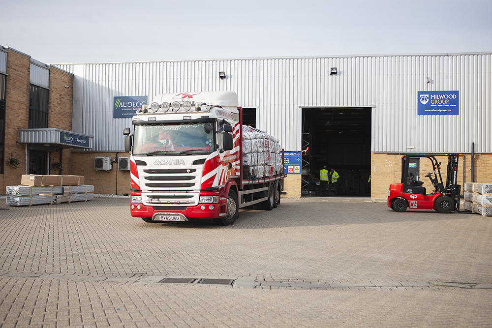 Busy morning at AliDeck HQ as back to back deliveries of large amounts of aluminium decking and balcony components stock material arrive at Rochester, factory team swing into action as production marches on