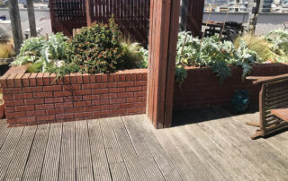 Large roof terrace decking replacement project completed in Bermondsey, London, as part of refurbishment works for The Hyde Group