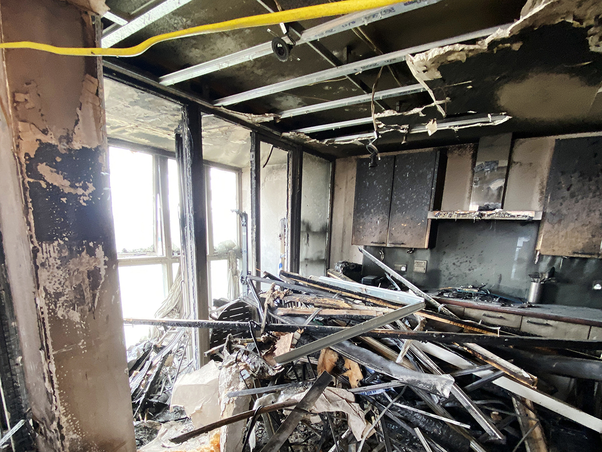 Gutted interior of a flat from a fire started on a balcony by a carelessly discarded cigarette
