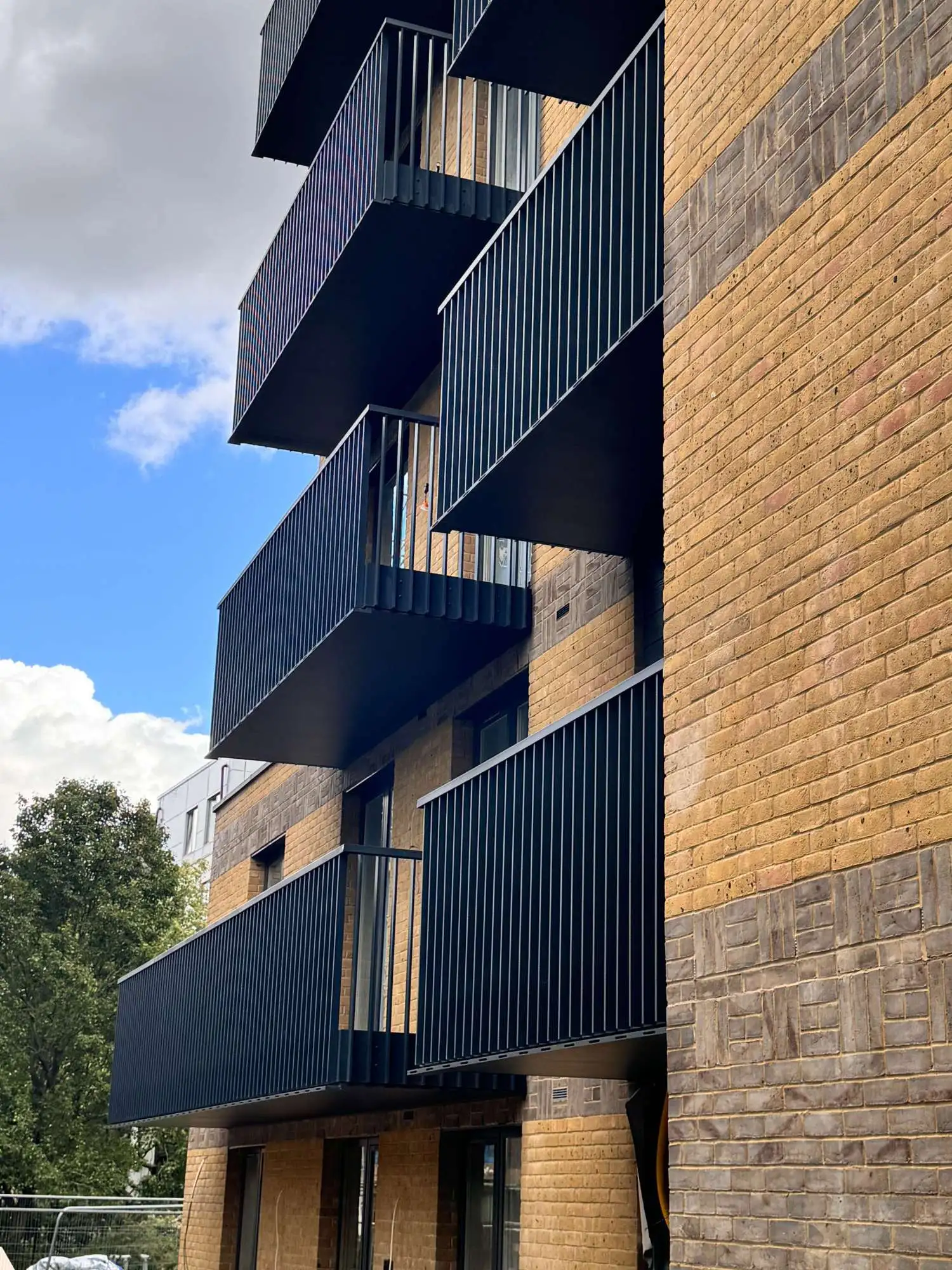 AliClad Flow Punched Gutter Installation, Aluminium Balcony Soffit in Whitechapel for PMS Composites, Sidney Street Project